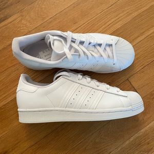 White Adidas Superstars